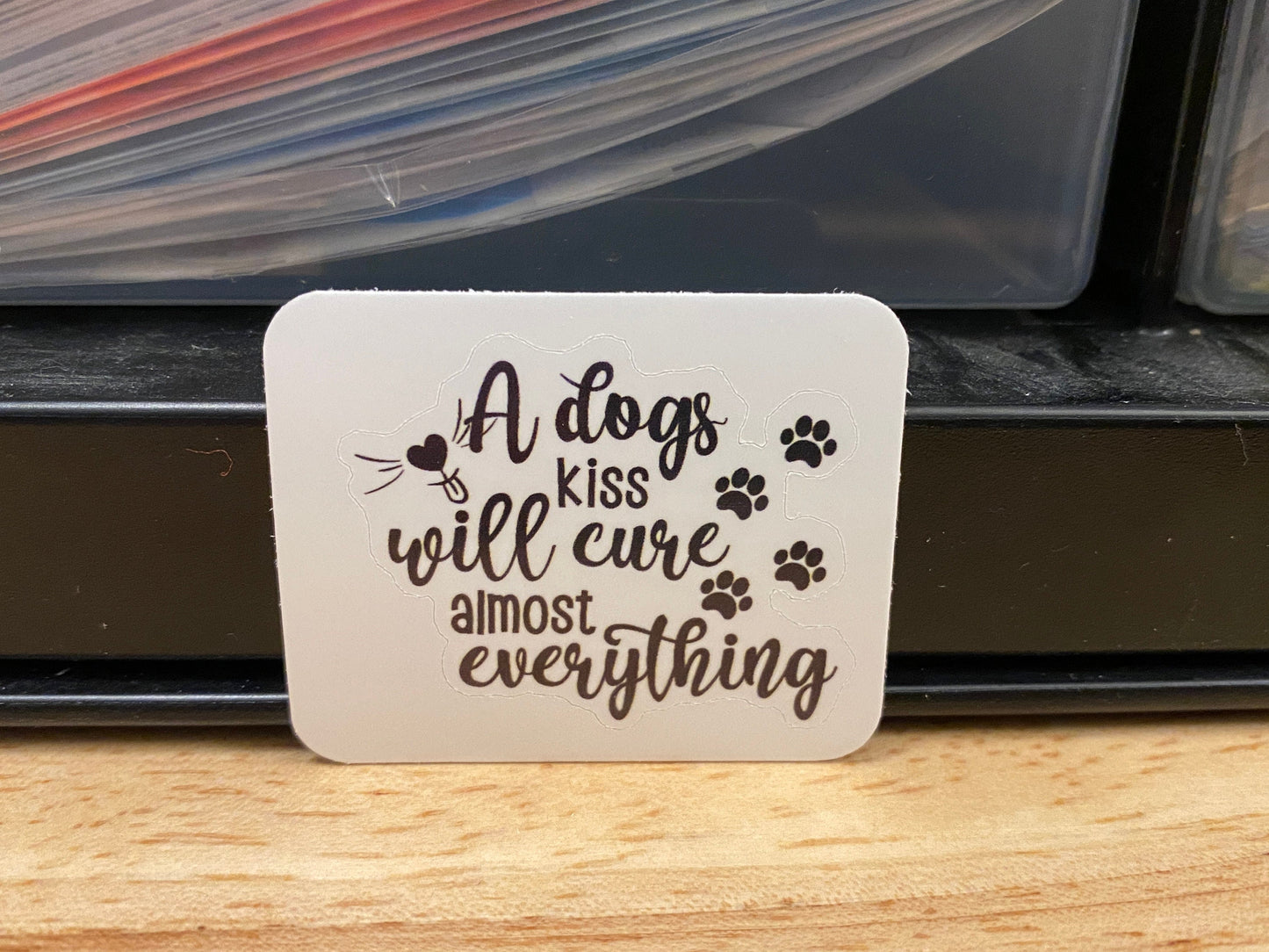 A Dog Kiss will cure almost everything Sticker