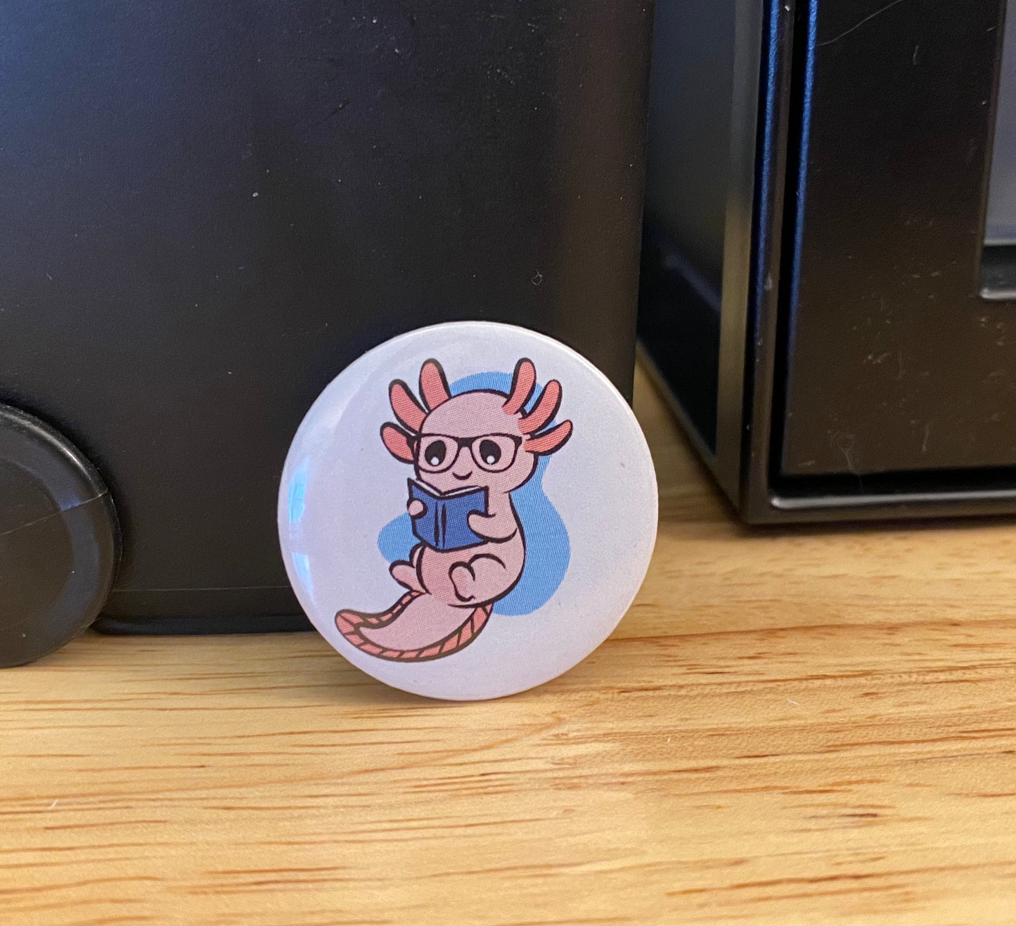 1.25" Button Pin Axolotl Reading a book