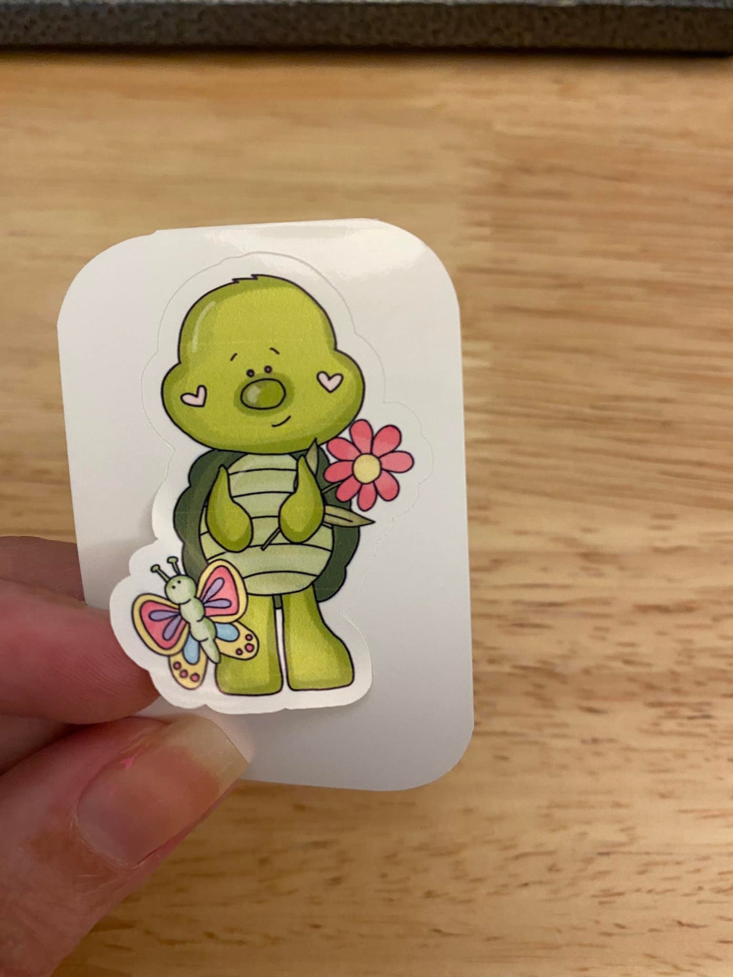Boy Turtle holding Flower STICKER