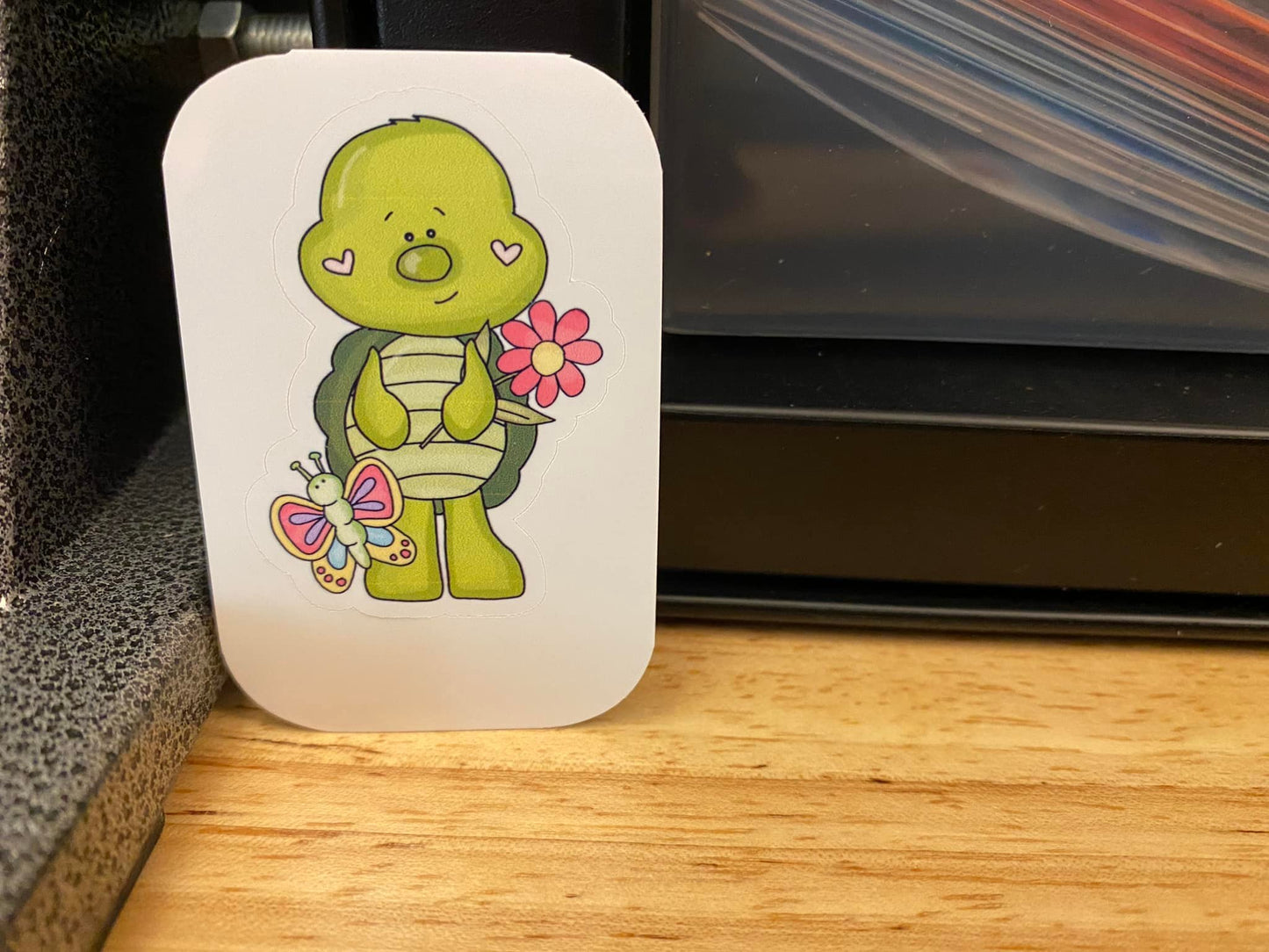 Boy Turtle holding Flower STICKER