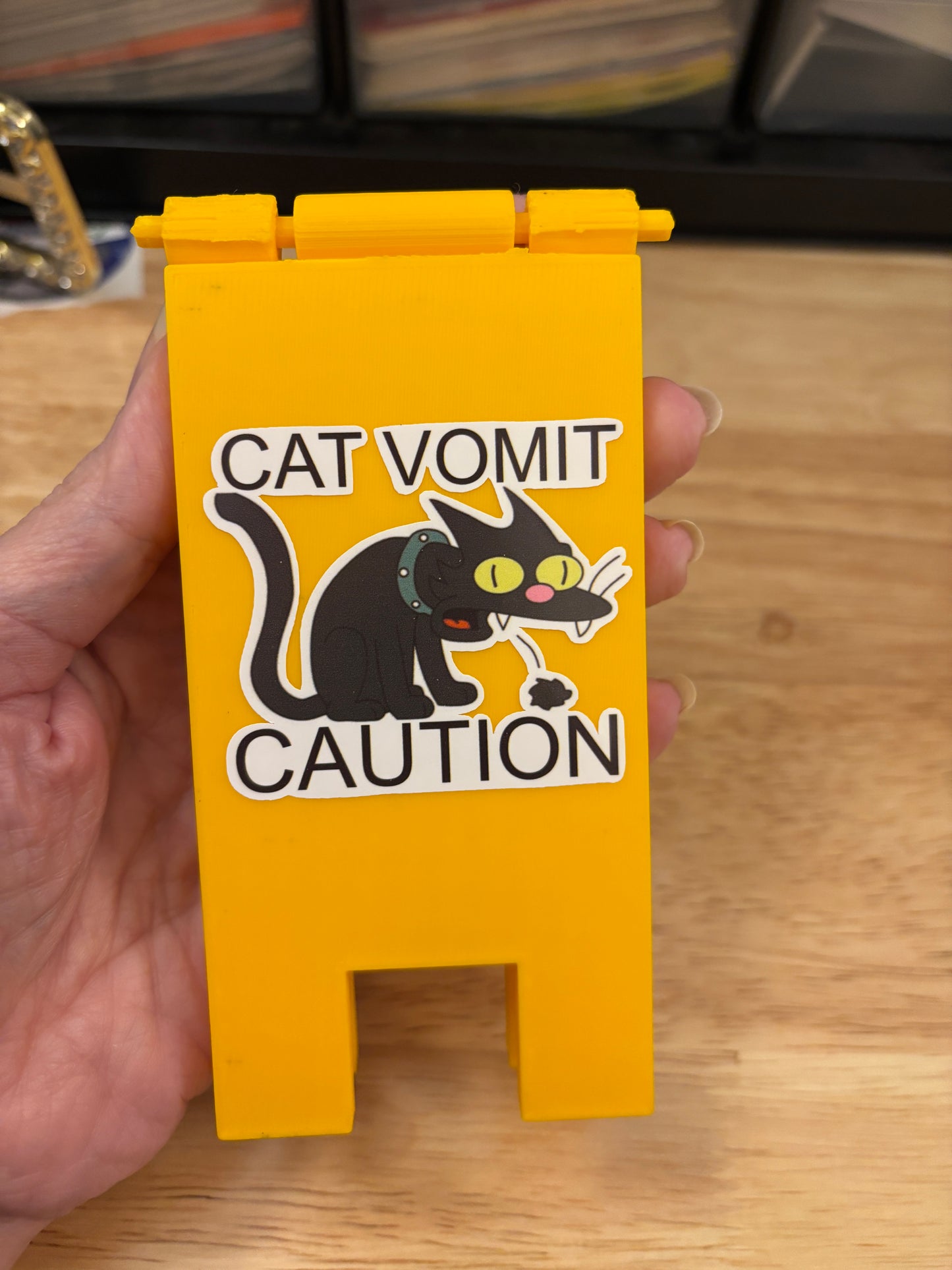 Caution cat vomit sign