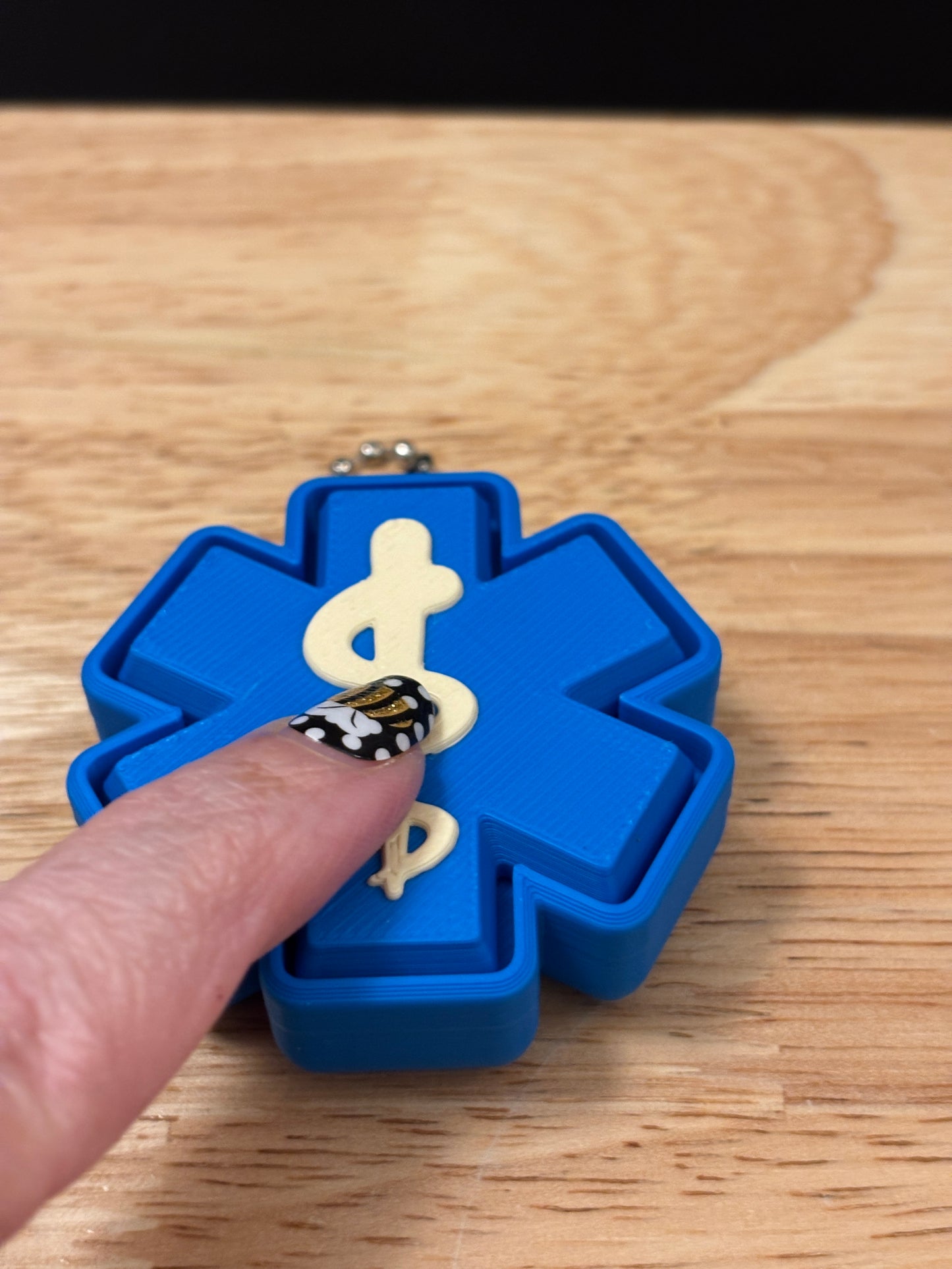 Clicky Medical design on fidget key chain