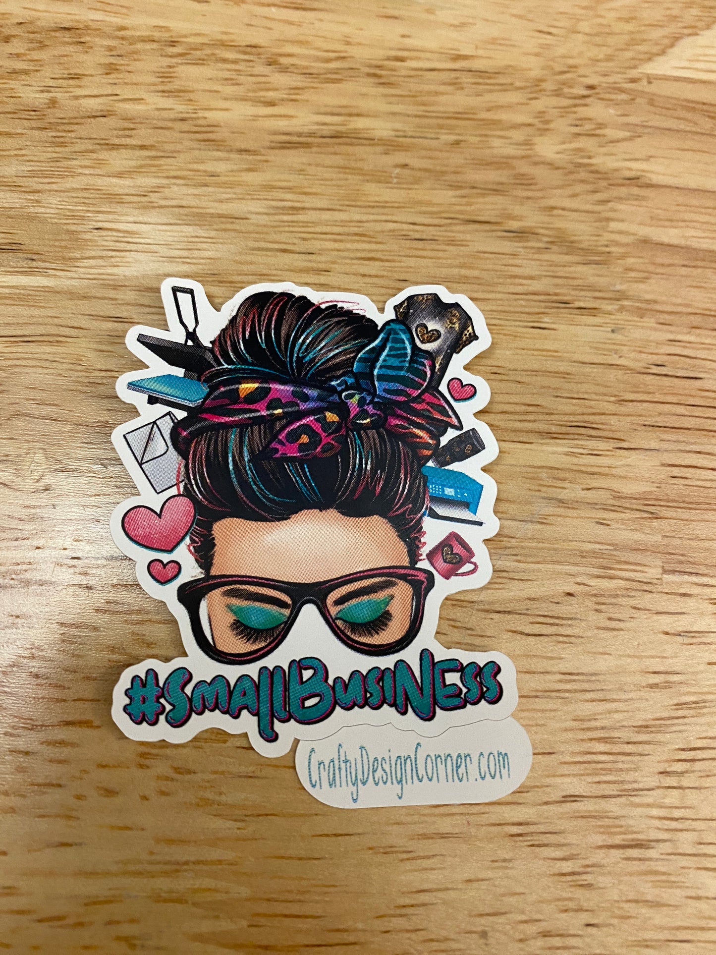 Small business lady with hair bun and glasses