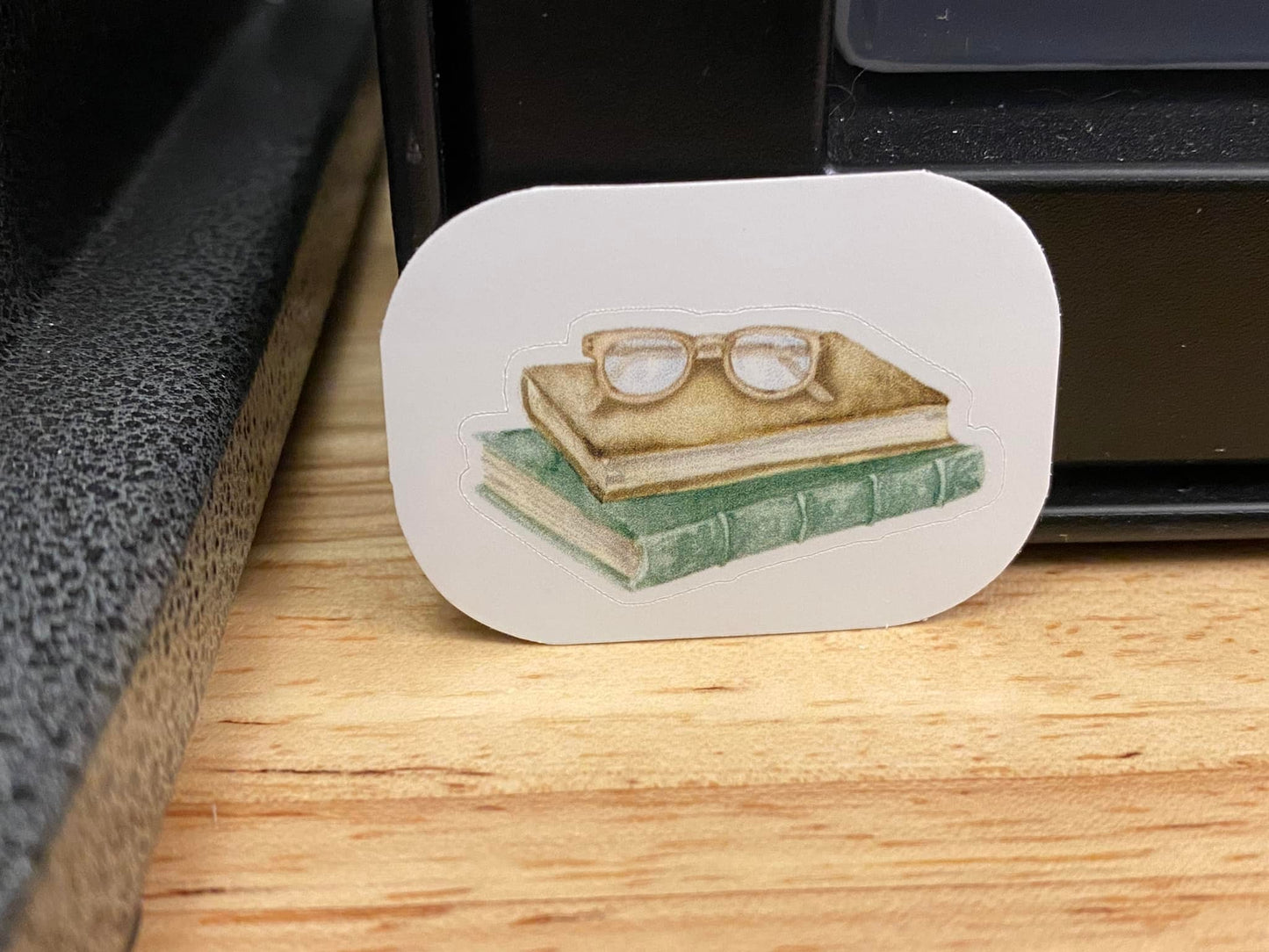 Small Stack of Books with Glasses Sticker