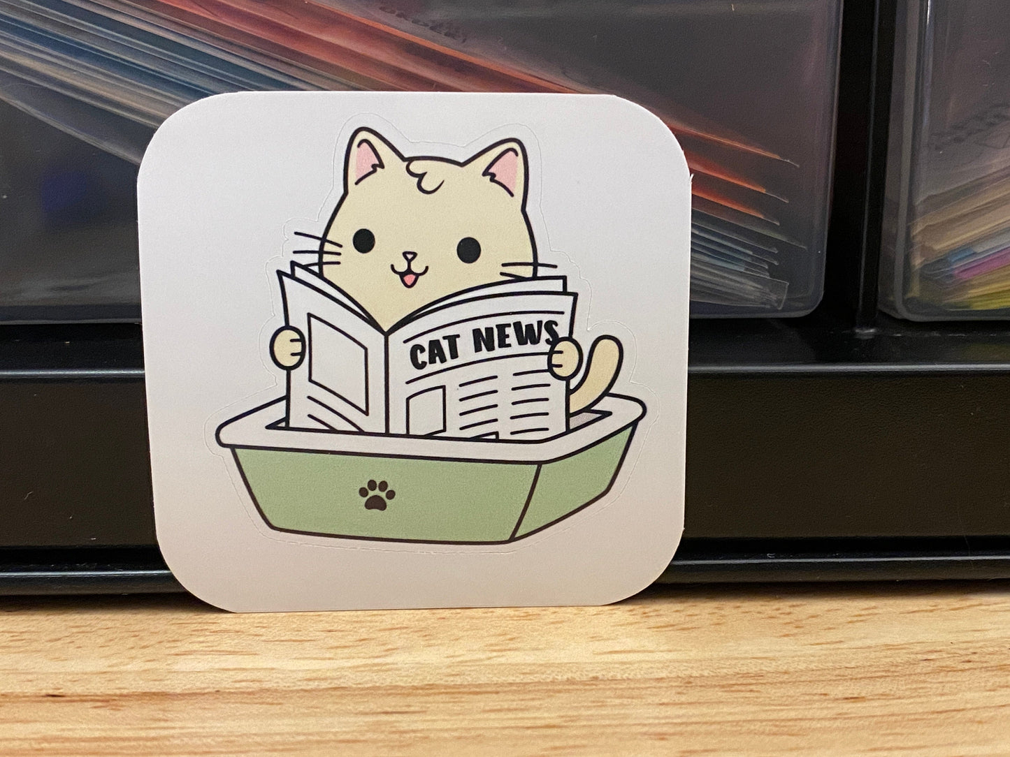 Cat using the litter box Sticker