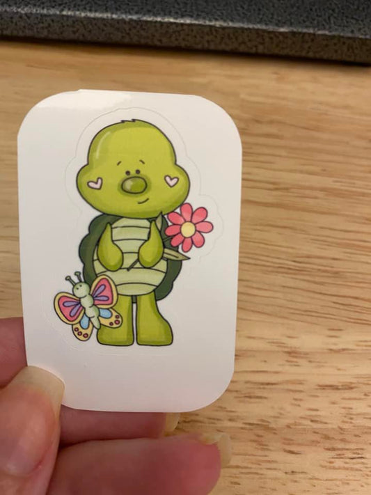 Boy Turtle holding Flower STICKER