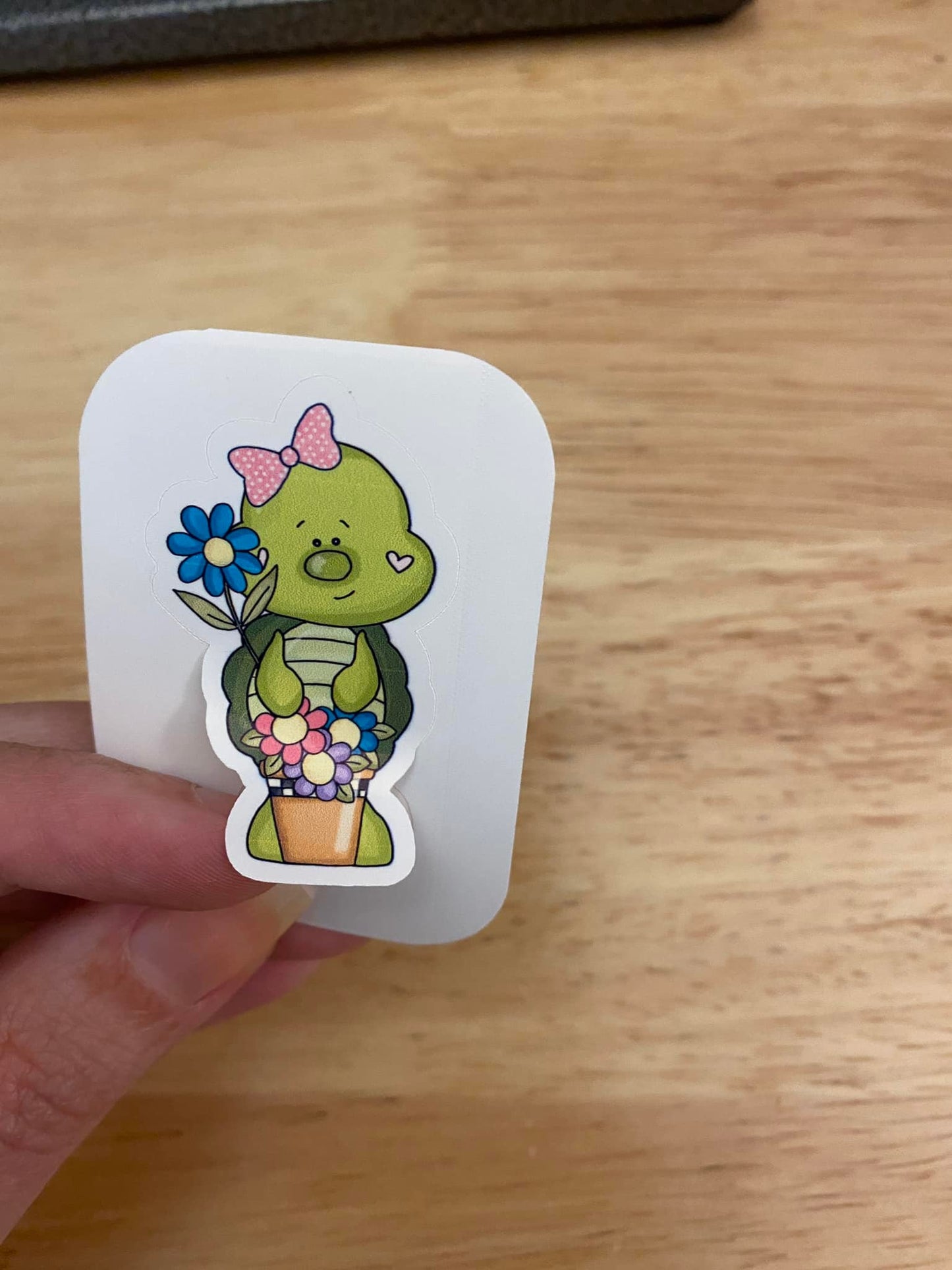 Girl Turtle holding Flower STICKER